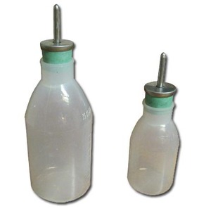 Two white plastic squeeze bottles with metal pour spouts and green collars, different sizes.