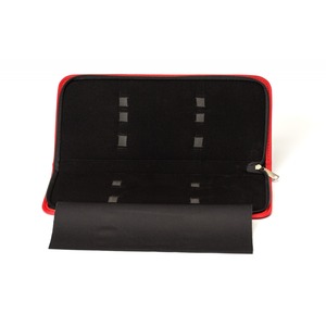 Red zippered case opened to a black interior with vertical elastic card slots.
