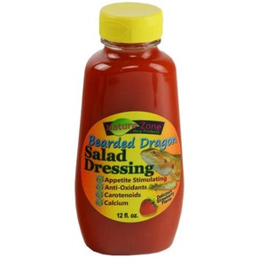 Red salad dressing bottle with a yellow cap; label reads Bearded Dragon Salad Dressing.