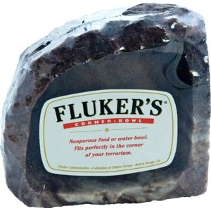 Dark rock with a Fluker’s Corner-Bowl label for a nonporous food or water bowl.