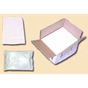 Open cardboard box with pink interior and white insert, plus folded white cloth and silver pouch on beige background.